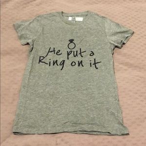 Grey “He put a ring on it” engagement t-shirt